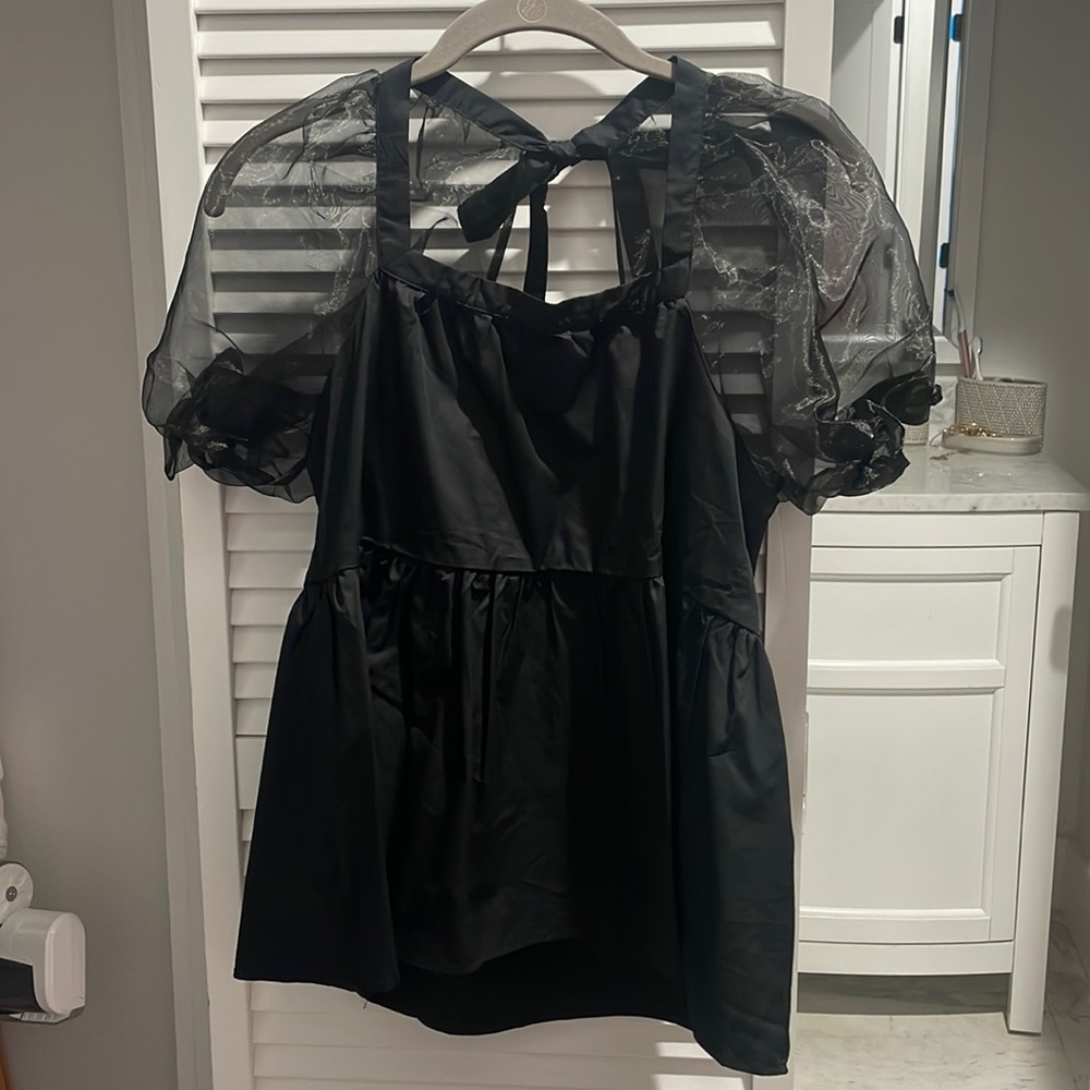 Black top with puffy meshed sleeves